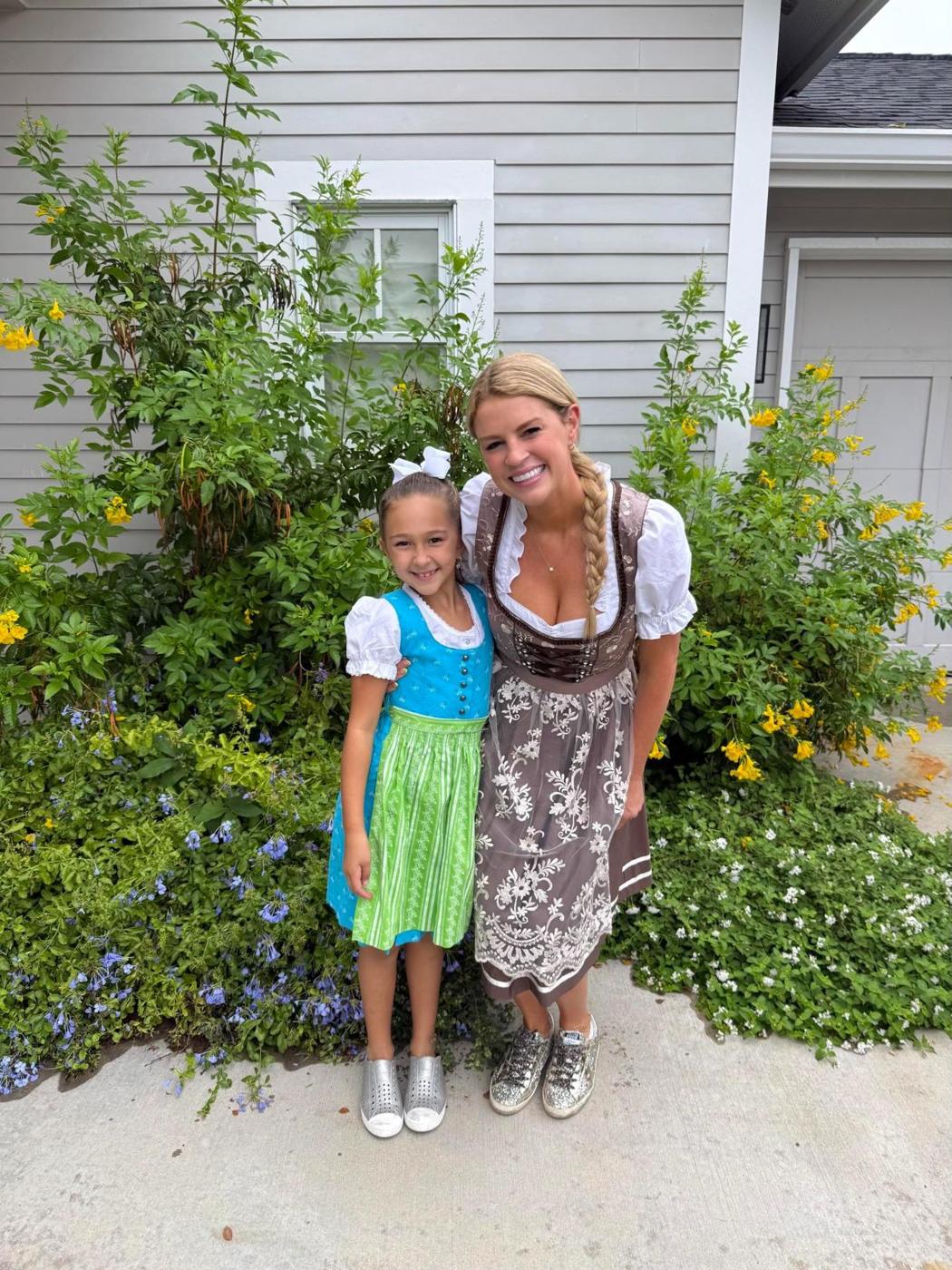 Savannah Sikes and her daughter in dirndls at Fredericksburg Oktoberfest 2026