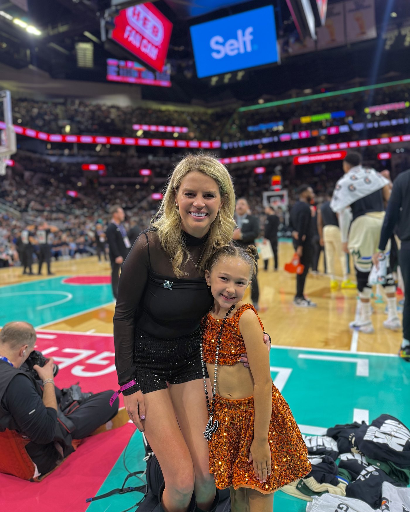 Savannah Sikes on the court at a San Antonio Spurs game